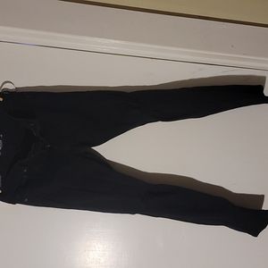 Hollister black in color with holes in the knees 30 x 32